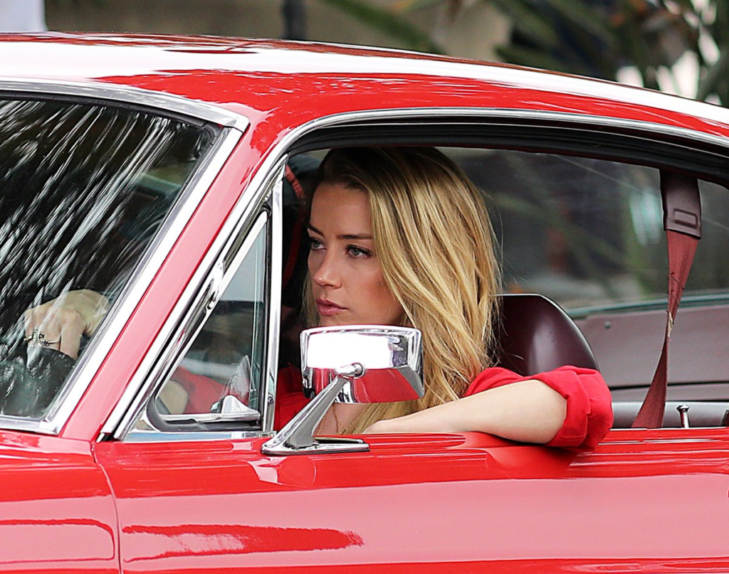 Amber Heard in a Car